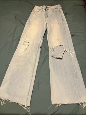 Vibrant Light Blue Distressed Flare Jeans